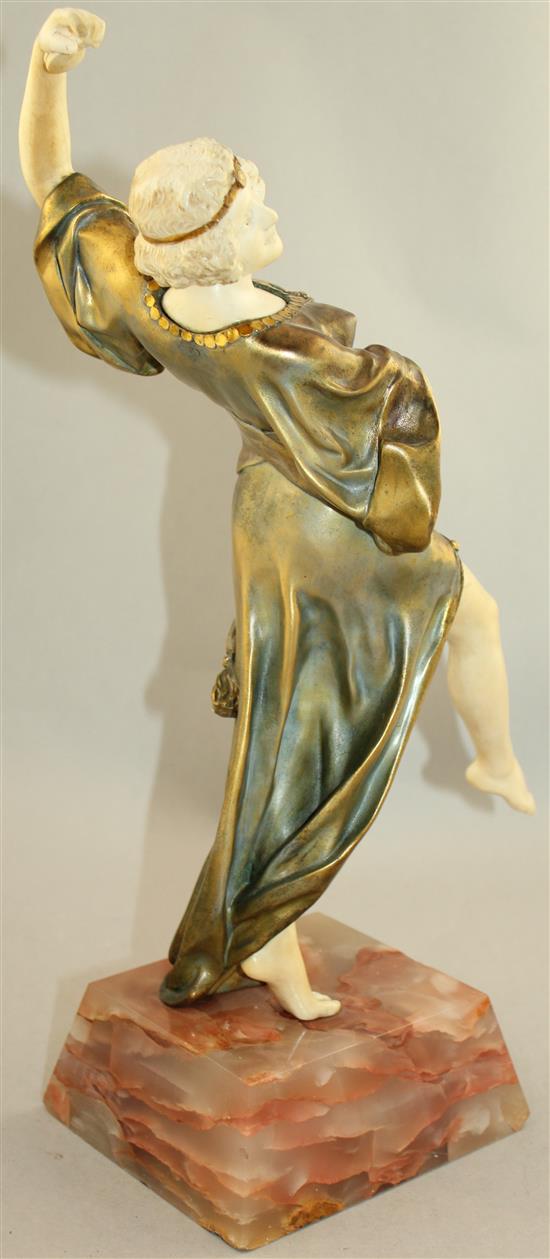 Eduardo Rossi (1867-1926). An Art Deco ivory and gilt bronze figure Oriental Dancer, overall 16.5in.